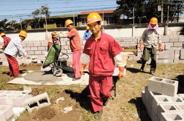 trabajadores chinos