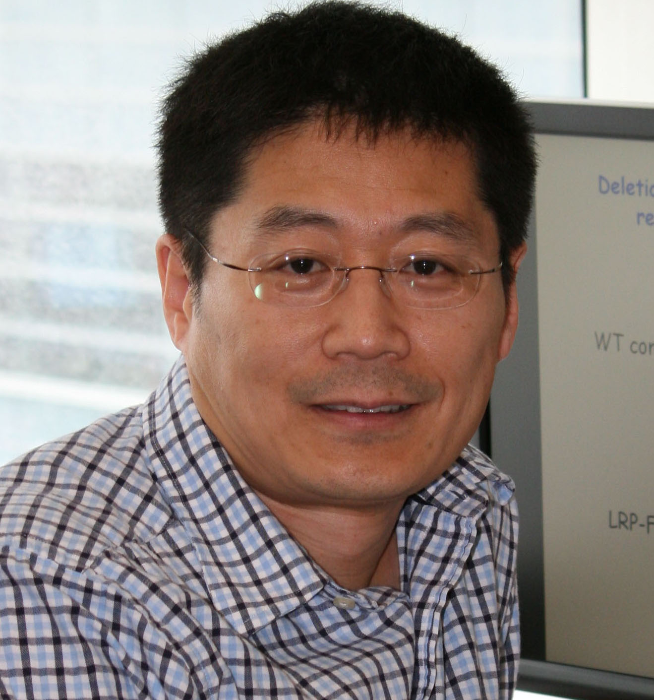 Dr. Guojun Bu